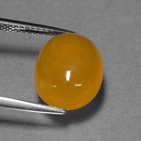 4,29 ctw natürlicher orangefarbener Feueropal, Oval Schliff, Lichtdurchlässig