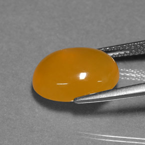 4,29 ctw natürlicher orangefarbener Feueropal, Oval Schliff, Lichtdurchlässig