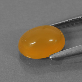 1,30 ctw natürlicher orangefarbener Feueropal, Oval Schliff, Lichtdurchlässig