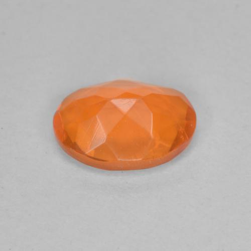 0,65 ctw natürlicher orangefarbener Feueropal, Oval Schliff, Transparent