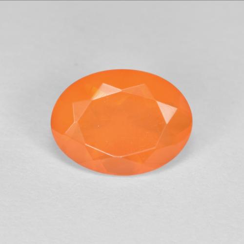 0,69 ctw natürlicher orangefarbener Feueropal, Oval Schliff, Transparent