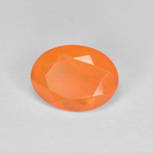 0,69 ctw natürlicher orangefarbener Feueropal, Oval Schliff, Transparent
