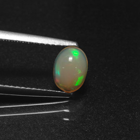 0,58 ctw natürlicher mehrfarbiger Opal, Oval Schliff, Lichtdurchlässig