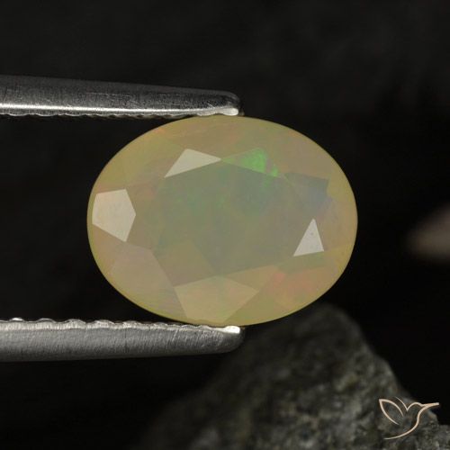 0.97ct Natürlicher Mehrfarbig Opal, Oval, Transparent / Lichtdurchlässig