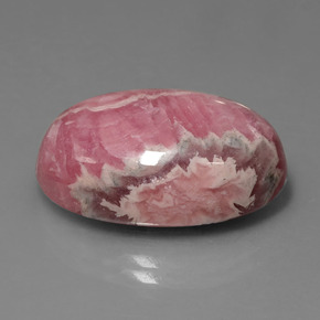 31,54 ctw natürlicher mehrfarbiger Rhodochrosit, Oval Schliff, Lichtundurchlässig