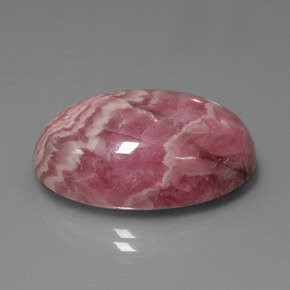 32,83 ctw natürlicher mehrfarbiger Rhodochrosit, Oval Schliff, Lichtundurchlässig