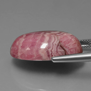 32,83 ctw natürlicher mehrfarbiger Rhodochrosit, Oval Schliff, Lichtundurchlässig