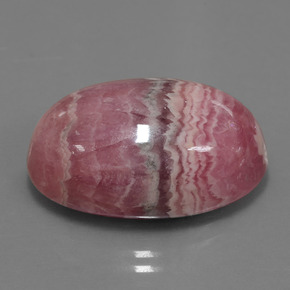 33,91 ctw natürlicher mehrfarbiger Rhodochrosit, Oval Schliff, Lichtundurchlässig