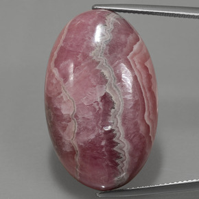 56,15 ctw natürlicher mehrfarbiger Rhodochrosit, Oval Schliff, Lichtundurchlässig