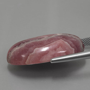 56,15 ctw natürlicher mehrfarbiger Rhodochrosit, Oval Schliff, Lichtundurchlässig