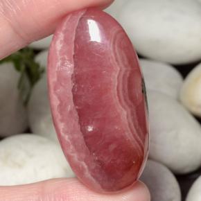 63,40 ctw natürlicher mehrfarbiger Rhodochrosit, Oval Schliff, Lichtdurchlässig