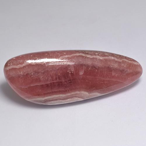 60,84 ctw natürlicher mehrfarbiger Rhodochrosit, Fantasieschliff, Lichtdurchlässig