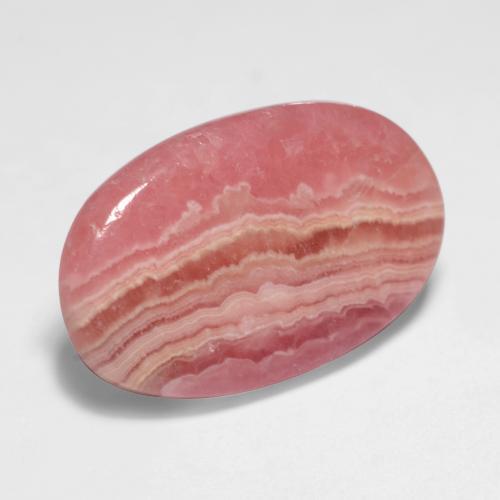 11,55 ctw natürlicher mehrfarbiger Rhodochrosit, Oval Schliff, Lichtdurchlässig