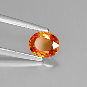 0,69 ctw natürlicher orangefarbener Saphir, Oval Schliff, VVS-VS