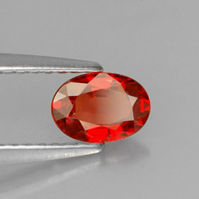 0,60 ctw natürlicher orangefarbener Saphir, Oval Schliff, VS