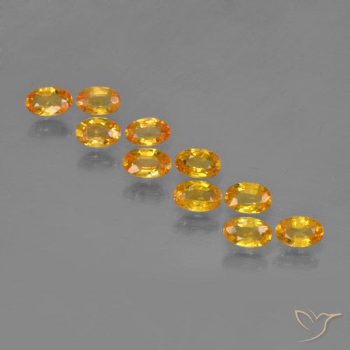 3.45ctw Natürlicher Dunkelorange-Gold Saphir, Oval, VS