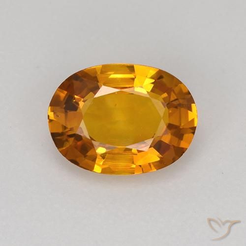 0.77ct Natürlicher Mittelorange Saphir, Oval, VS