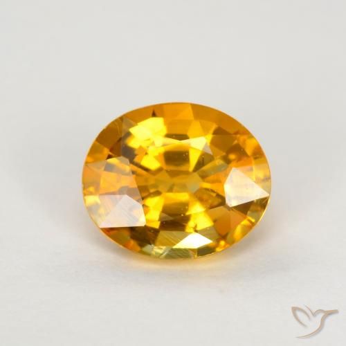 0.74ct Natürlicher Mittelorange Saphir, Oval, VS, Photo A