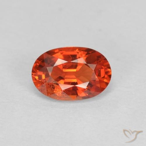 0.60ct Natürlicher rötlich-orange Saphir, Oval, VS, Photo A
