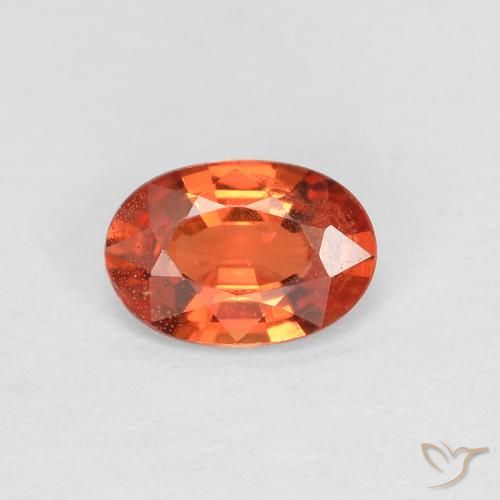 0.49ct Natürlicher rötlich-orange Saphir, Oval, VS