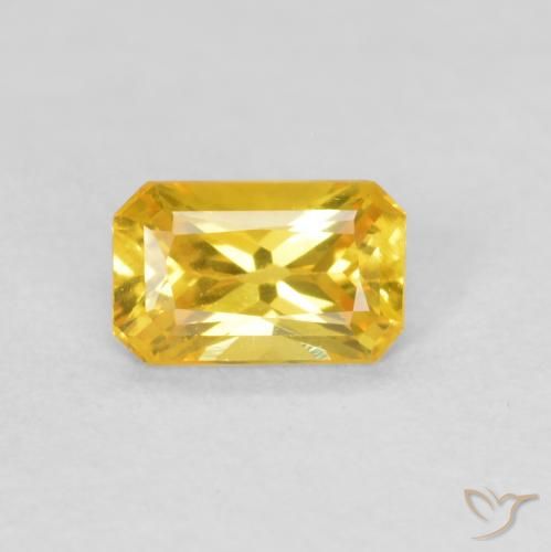 0.38ct Natürlicher gold-orange Saphir, Smaragdschliff, VS