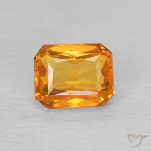 0.68ct Natürlicher Mittelorange Saphir, Smaragdschliff, VS