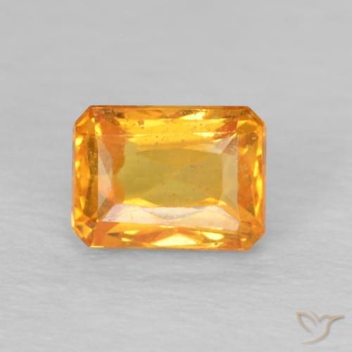 0.74ct Natürlicher Mittelorange Saphir, Smaragdschliff, VS