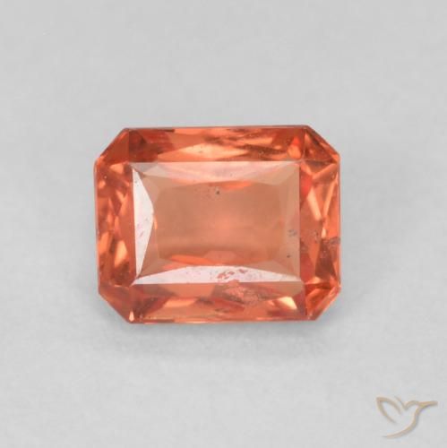 0.59ct Natürlicher orange-rot Saphir, Smaragdschliff, VS-SI