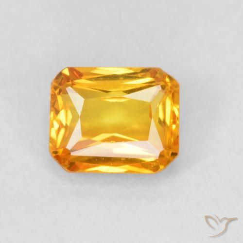 0.67ct Natürlicher Aprikose Orange Saphir, Smaragdschliff, VVS-VS
