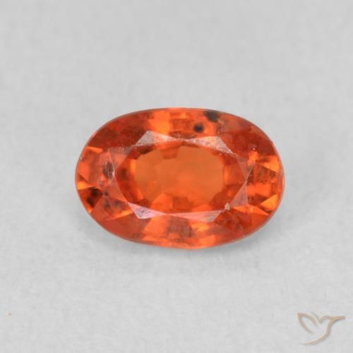 0.68ct Natürlicher Mittelorange Saphir, Oval, VS