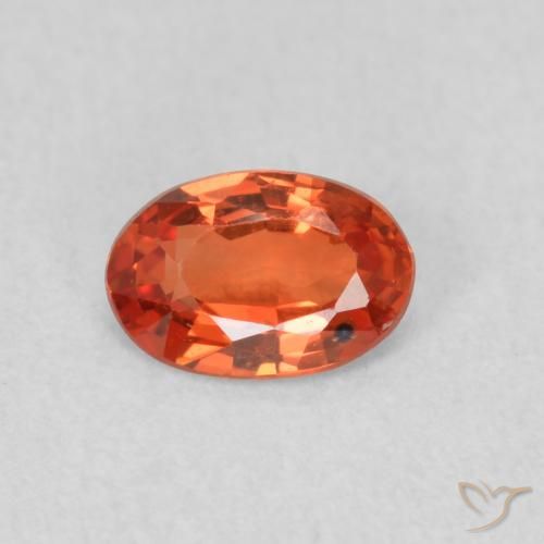 0.56ct Natürlicher rötlich-orange Saphir, Oval, VS