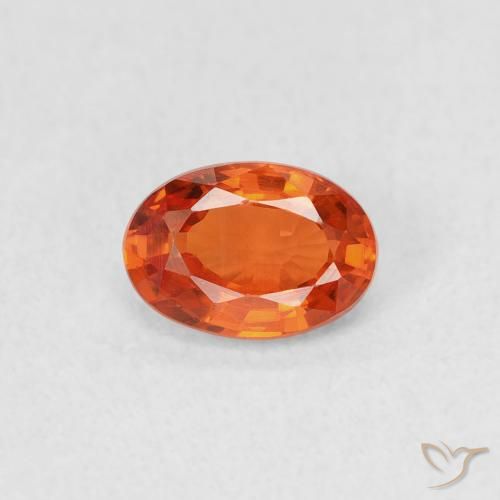 0.69ct Natürlicher rötlich-orange Saphir, Oval, VS