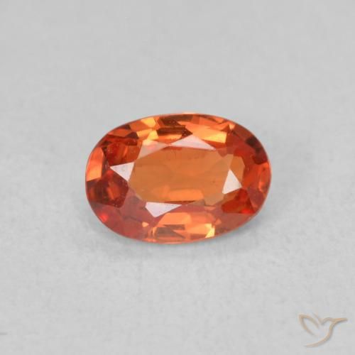 0.54ct Natürlicher rötlich-orange Saphir, Oval, VS