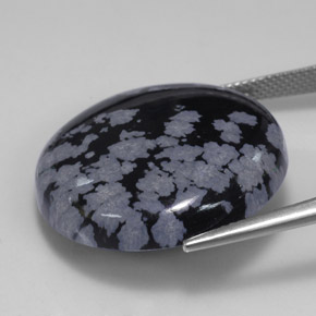 28,56 ctw natürlicher schwarzer Schneeflockenobsidian, Rundschliff, Lichtundurchlässig