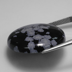 26,71 ctw natürlicher mehrfarbiger Schneeflockenobsidian, Rundschliff, Lichtundurchlässig