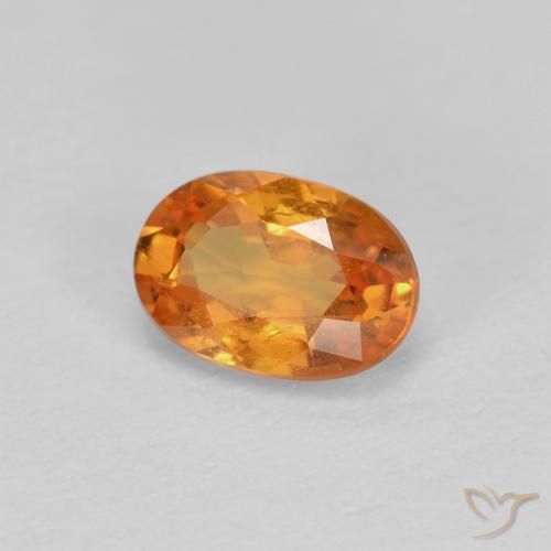 0.56ct Natürlicher hellorange Spessartit-Garn, Oval, VS-SI