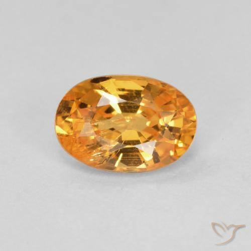 0.60ct Natürlicher Aprikose Orange Spessartit-Garn, Oval, VS-SI