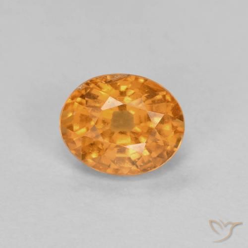 0.60ct Natürlicher Aprikose Orange Spessartit-Garn, Oval, VS-SI