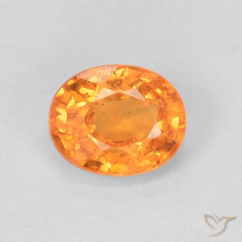 0.56ct Natürlicher hellorange Spessartit-Garn, Oval, VS-SI
