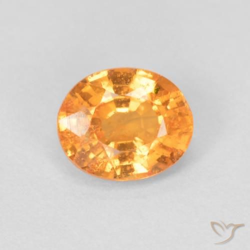 0.56ct Natürlicher hellorange Spessartit-Garn, Oval, VS-SI