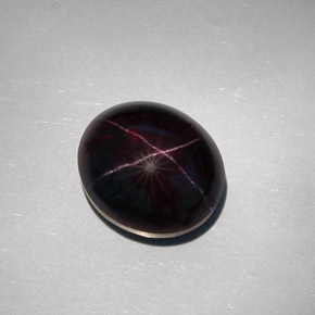 32,55 ctw natürlicher schwarzer Stern-Granat, Oval Schliff, Lichtundurchlässig