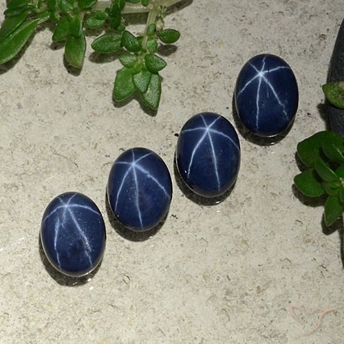 4.61ctw Natürlicher tiefblau Sternsaphir, Oval, Lichtundurchlässig