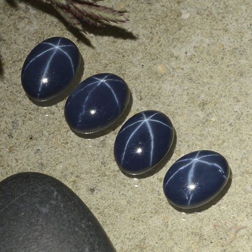 4.29ctw Natürlicher dunkelblau Sternsaphir, Oval, Lichtundurchlässig