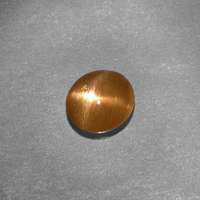 0,79 ctw natürlicher brauner Stern-Sonnenstein, Oval Schliff, Lichtundurchlässig