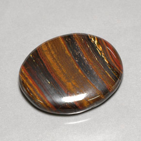 53,09 ctw natürlicher mehrfarbiger Tiger's Eye Matrix, Oval Schliff, Lichtundurchlässig
