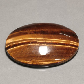 74,22 ctw natürlicher brauner Tiger's Eye, Oval Schliff, Lichtundurchlässig