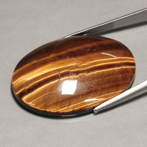 74,22 ctw natürlicher brauner Tiger's Eye, Oval Schliff, Lichtundurchlässig