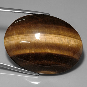 76,52 ctw natürlicher brauner Tiger's Eye, Oval Schliff, Lichtundurchlässig