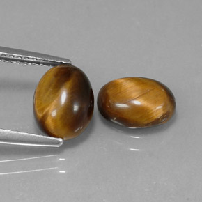 1,59 ctw natürlicher brauner Tiger's Eye, Oval Schliff, Lichtundurchlässig
