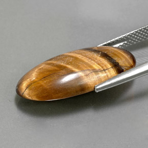 11,79 ctw natürlicher brauner Tiger's Eye, Oval Schliff, Lichtundurchlässig